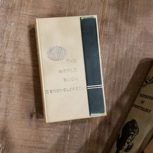 Vintage | World Book Encyclopedia Pocket Coin Bank